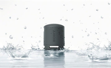 Sony SRS-XB100 Wireless Bluetooth Portable Lightweight Super-Compact Travel Speaker, Extra-Durable IP67 Waterproof & Dustproof, 16 Hour Battery, Versatile Strap, and Hands-Free Calling, Black New