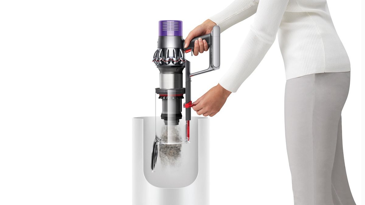Dyson V10 Absolute being emptied into a bin